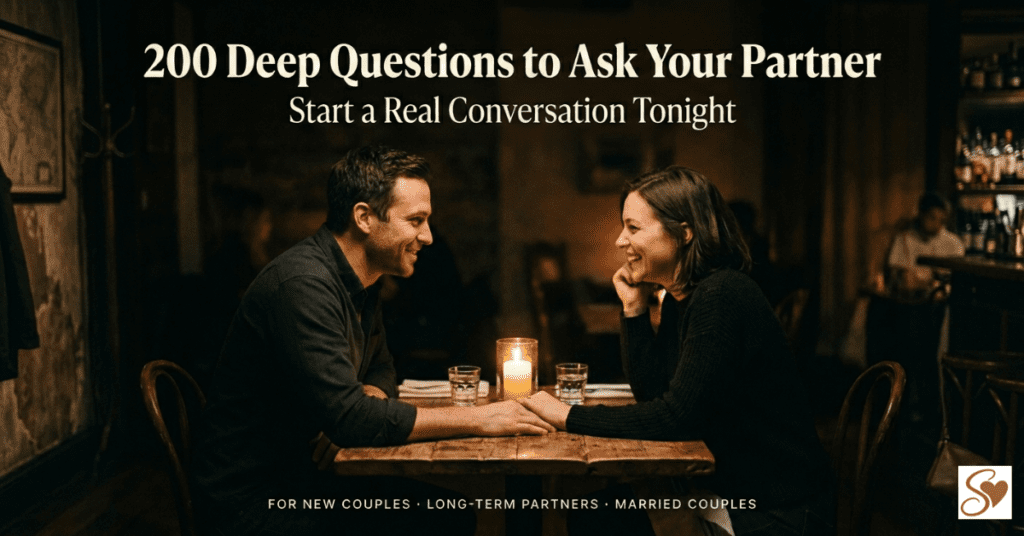 Two people having a deep conversation by candlelight at a small table representing deep questions for couples