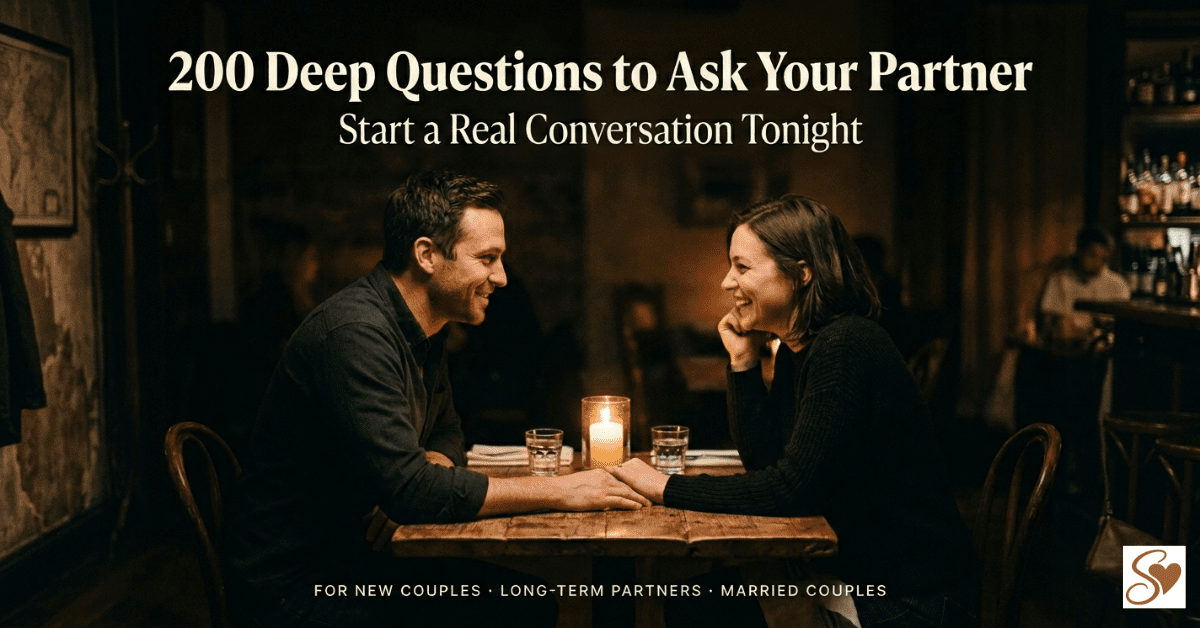 Two people having a deep conversation by candlelight at a small table representing deep questions for couples